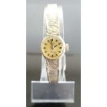 A lady's Rotary 9ct gold cased manual wind bracelet watch, with integral meshlink bracelet, having