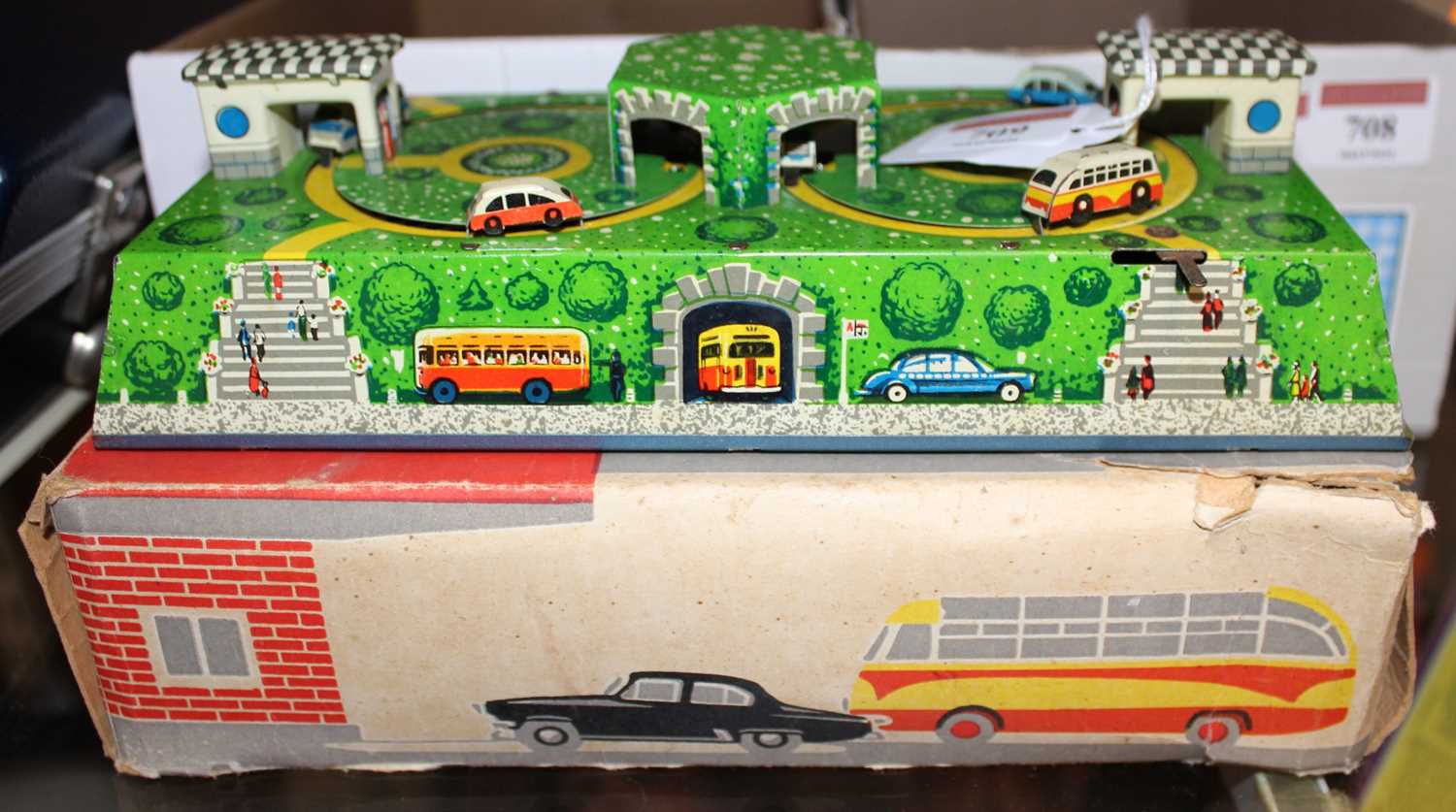 A Russian boxed tinplate clockwork wind-up toy cars on track, made by Abtotpacca
