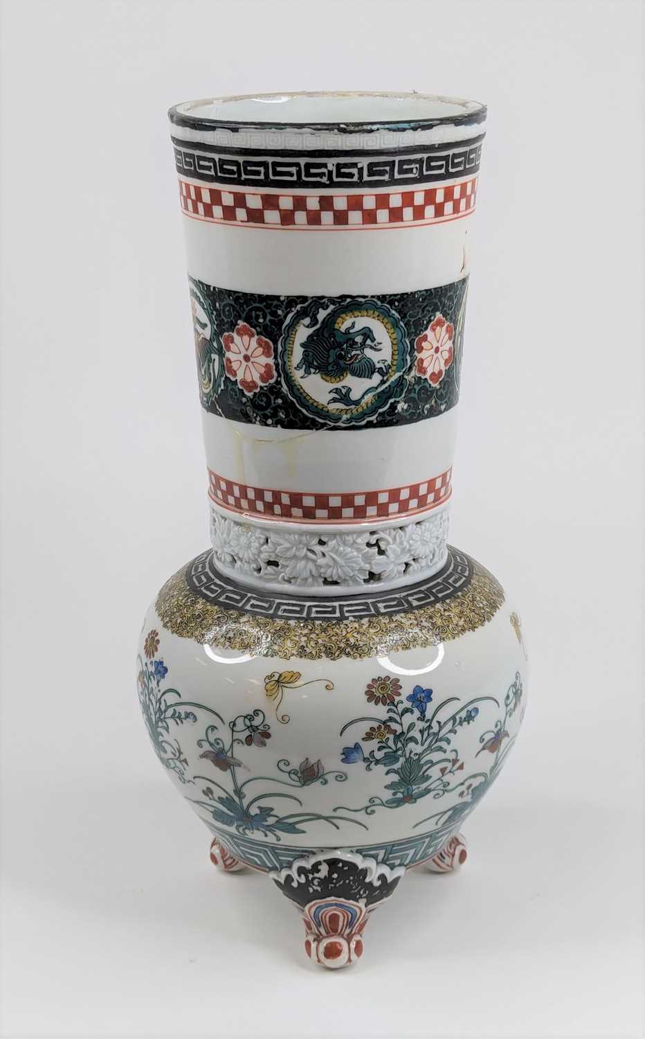 A Japanese porcelain vase, enamel decorated with flowers and dragons, height 36cm (a/f)