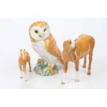 A Beswick model of an owl, No. 1046, h.19cm; together with a Beswick model of a horse and foal (3)