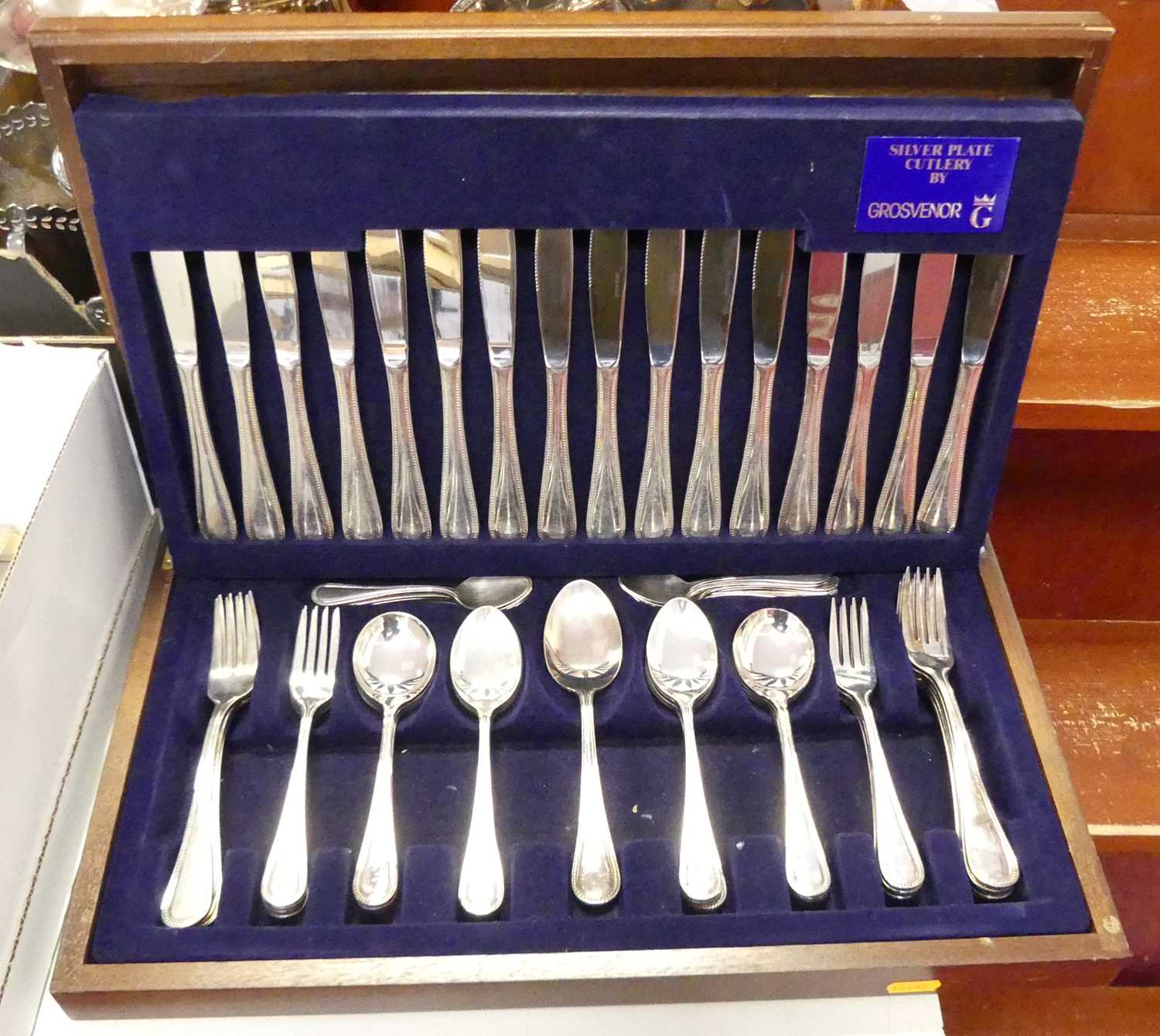 A canteen of silver plated cutlery, eight place setting, in a fitted wooden case, width 50cm
