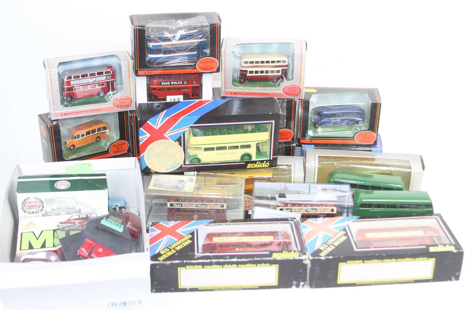 Four small boxes containing modern issue diecast to include EFE, half cab coach, various Mini