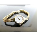 A lady's Accurist 9ct gold cased quartz dress watch, on 9ct gold bracelet, 11.4g, case dia.16mm