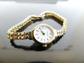 A lady's Accurist 9ct gold cased quartz dress watch, on 9ct gold bracelet, 11.4g, case dia.16mm