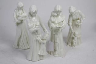 A collection of four Royal Worcester white glazed figures of mothers and children, the largest h.