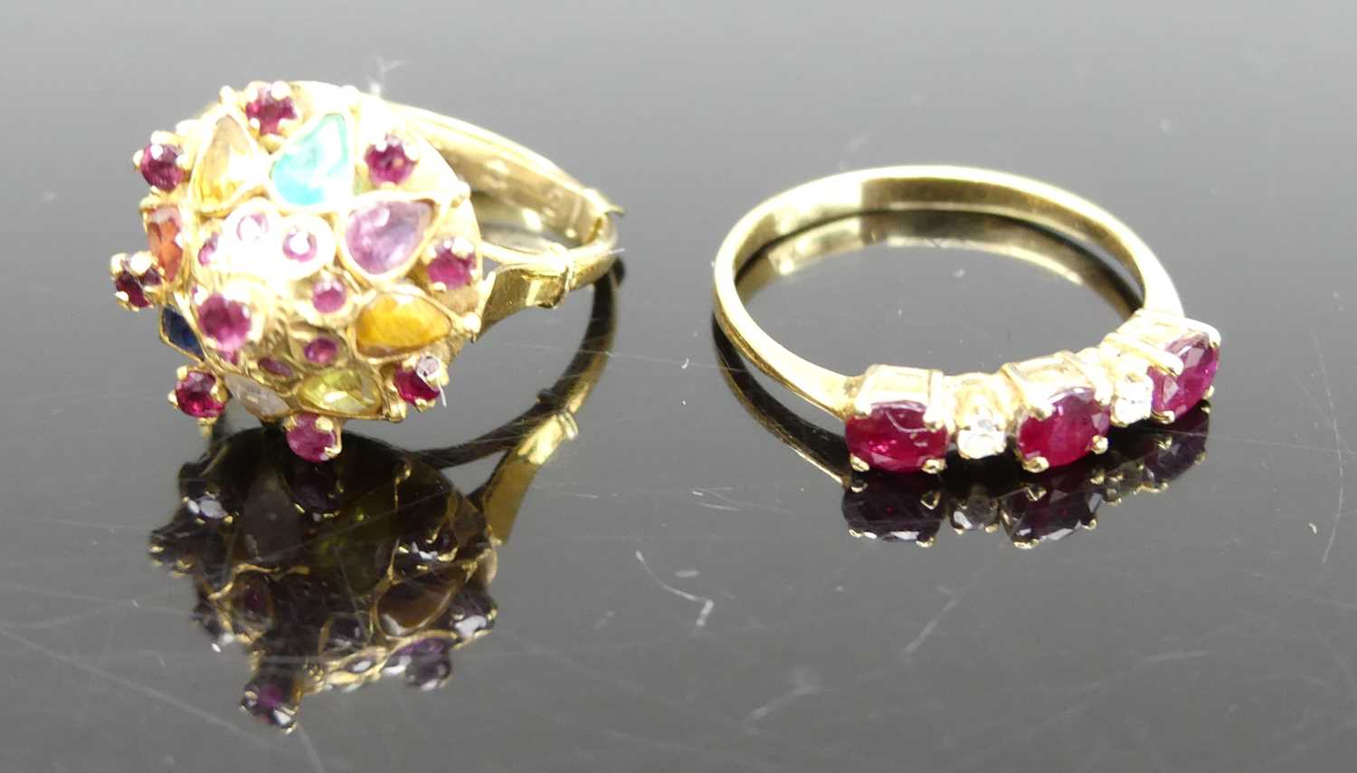 An 18ct gold, ruby and cz set half hoop ring, size M/N; together with a 14ct gold multi-stone set