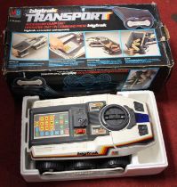 An MB Electronics Big Trak transport accessory dump unit; together with one other Not currently