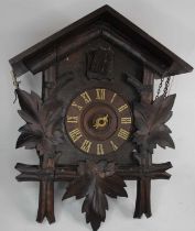 A vintage Swiss style cuckoo clock Is not in working order