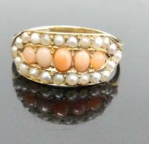 An 18ct gold, coral and seed pearl set dress ring, circa 1900, 2.6g, size M/N