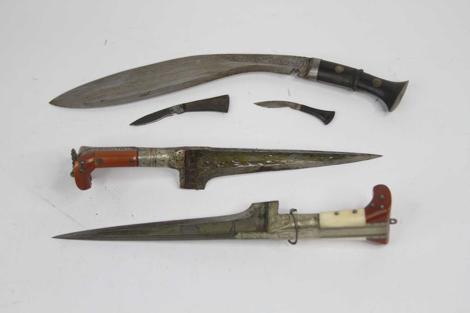 A vintage kukri with leather sheath, together with two Afghan Khyber knives (3) - Image 2 of 2