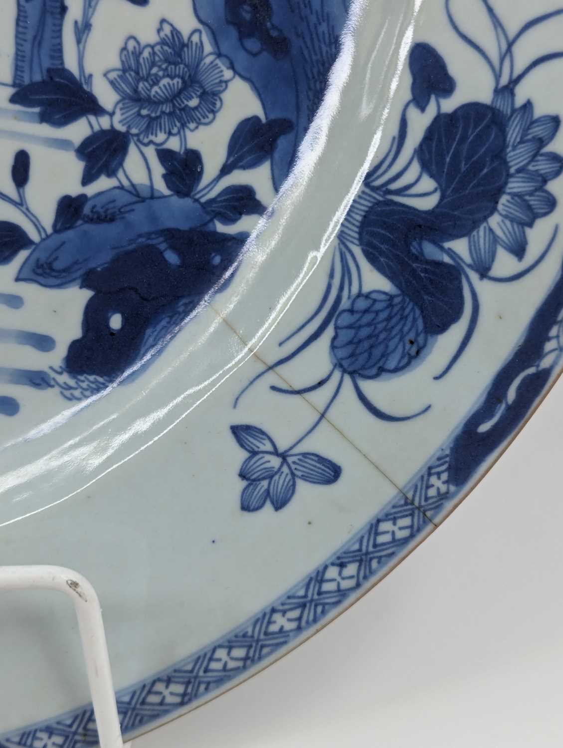An 18th century Chinese blue & white porcelain charger, decorated with a figure and Phoenix, dia. - Image 2 of 3