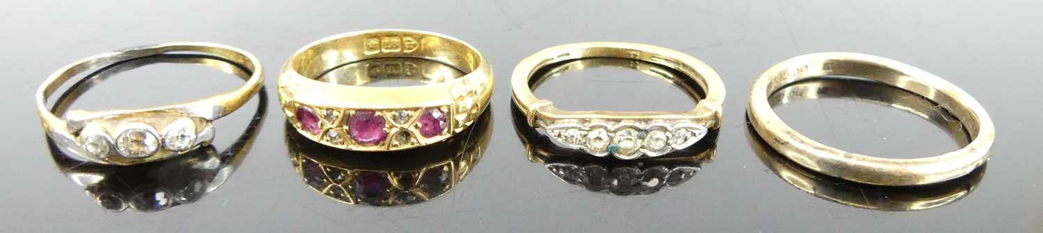 An 18ct gold, ruby and diamond point set half hoop ring; together with two 9ct gold diamond point