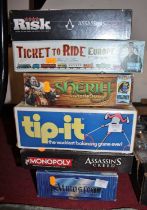 A quantity of various board games to include Assassins Creed Risk, Ticket to Ride Euro, etc