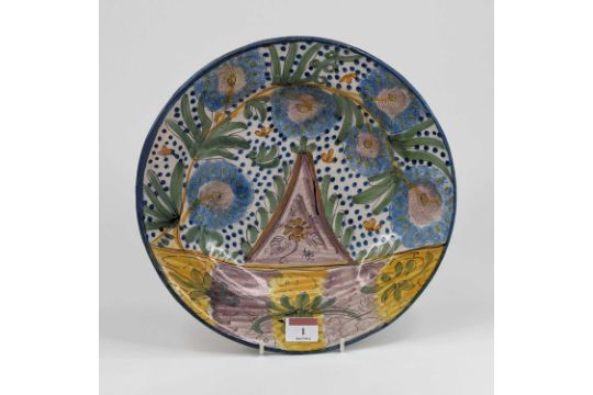 A 19th century Spanish polychrome tin glazed earthenware charger, probably Valencia, dia. 30cm - Image 1 of 2