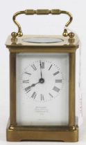 A reproduction French lacquered brass carriage clock, having visible platform escapement, twin