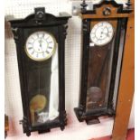 A circa 1900 Vienna walnut and ebonised droptrunk wall regulator, with weight, h.100cm; together