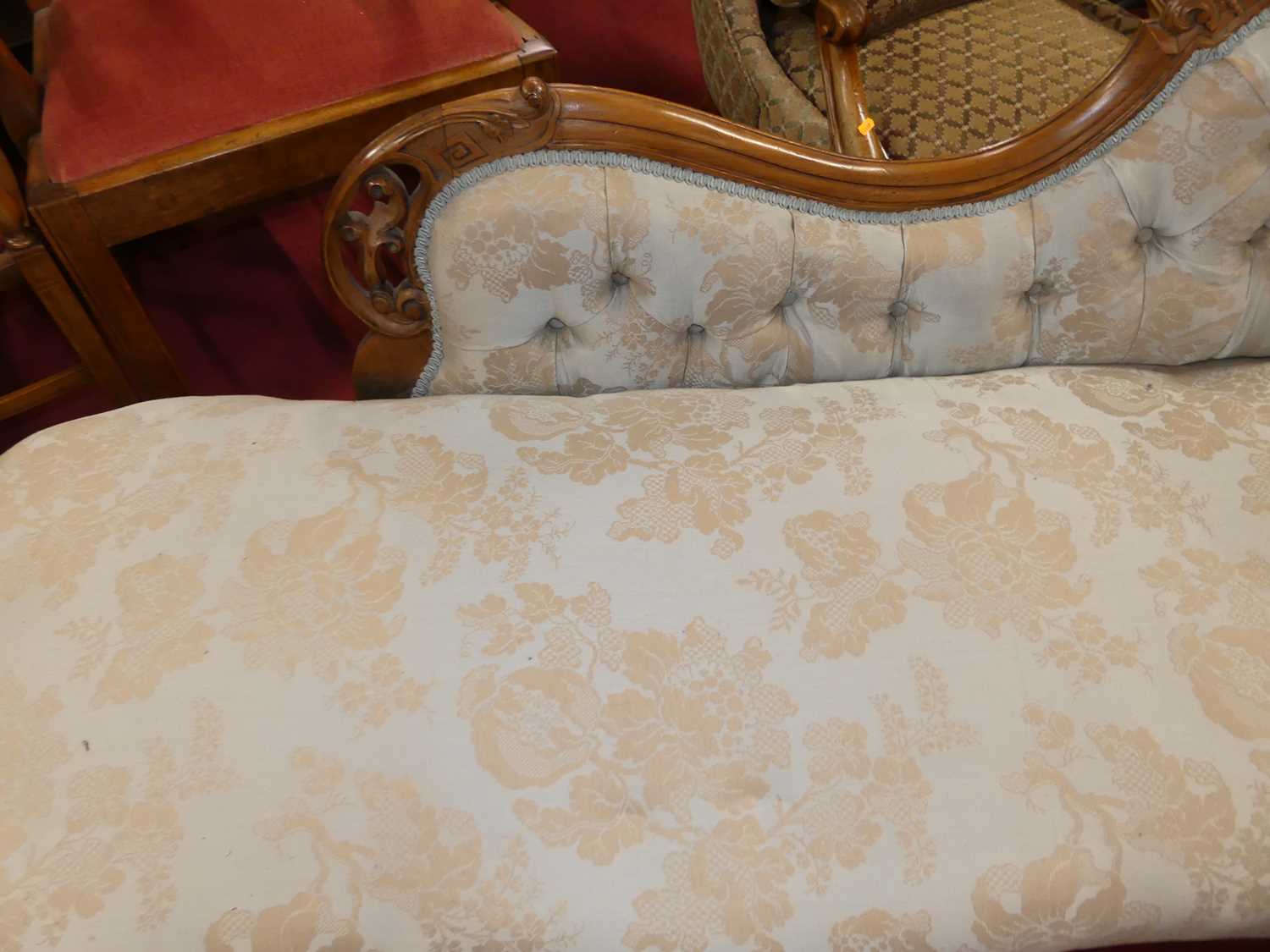 A mid-Victorian figured walnut framed and blue floral buttoned damask upholstered chaise-longue, - Image 4 of 5