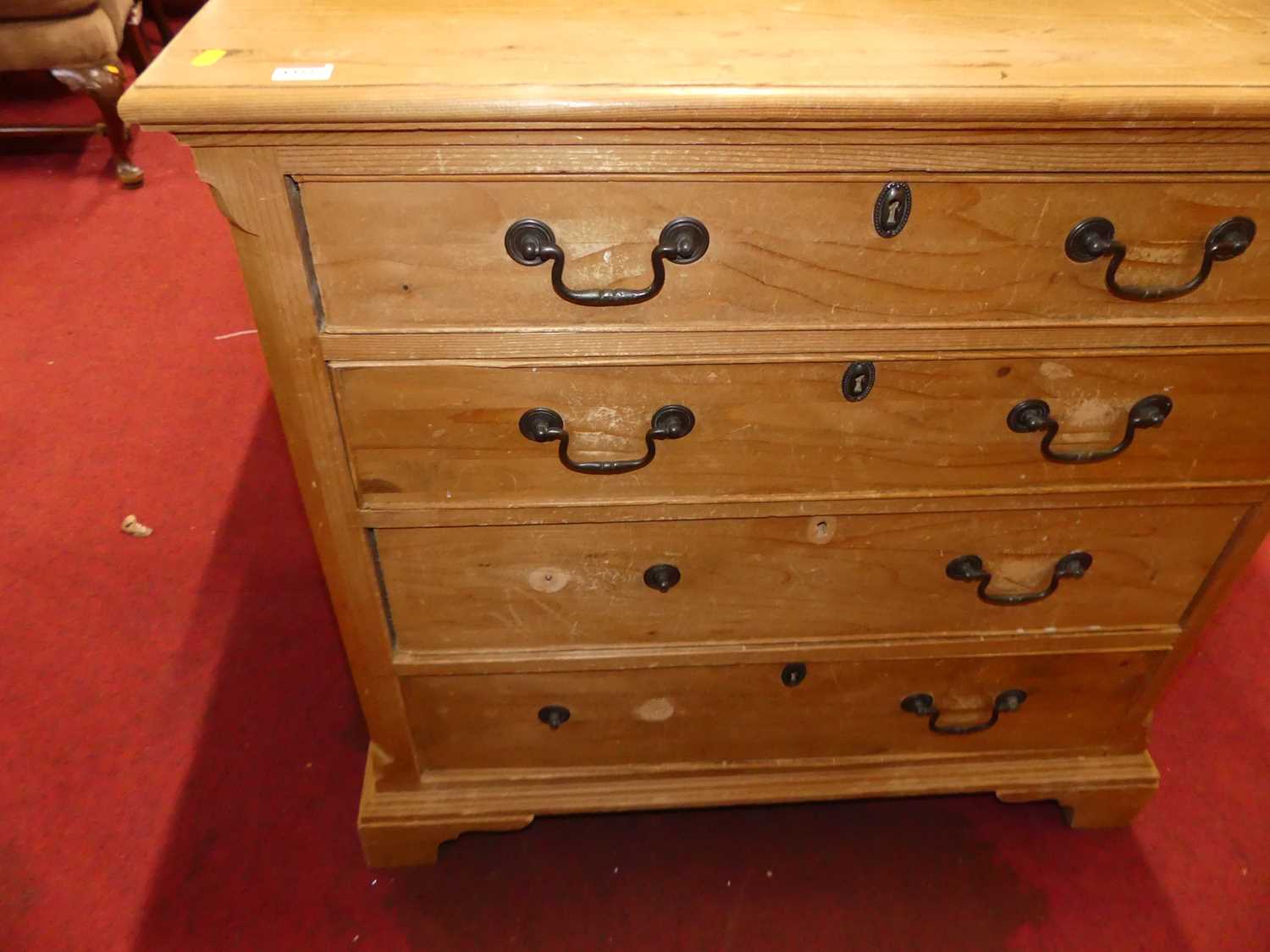 A pine chest of four long drawers on bracket supports, w.90cm Losses to handles and beading to edges - Image 3 of 4