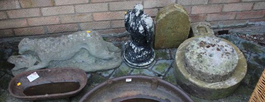 A small cast iron agricultural feeding trough, together with further sundry stone garden ornaments