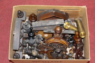 A box containing assorted Vienna clock pediments, finials, aprons, and mouldings etc