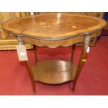 A French mahogany, walnut, floral satinwood inlaid and further gilt metal mounted shaped top two-