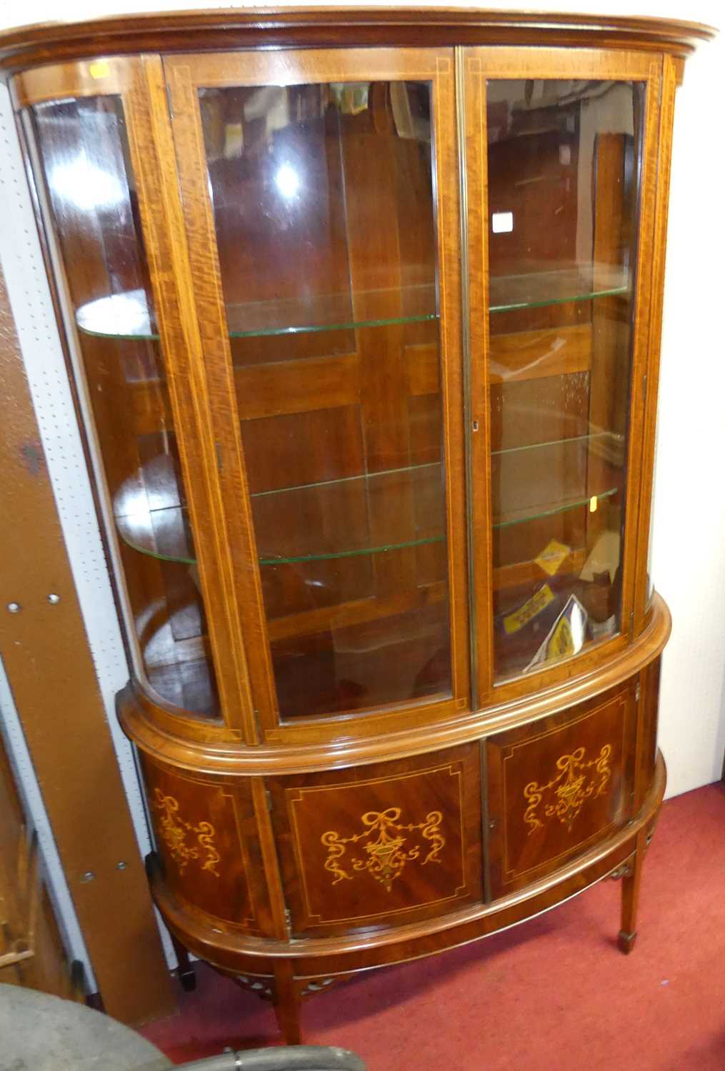 An Edwardian mahogany and floral satin wood inlaid demi-lune double door glazed china display