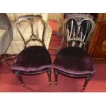 A set of four mid-Victorian ebonised and gilt decorated salon side chairs, having plush purple