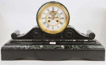 A late Victorian polished slate and veined green marble drumhead mantel clock having visible