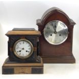 A late Victorian walnut and ebonised mantel clock having French brass cylinder movement striking