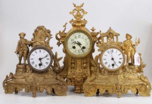 A late 19th century French gilt metal mantel clock, together with two others (3)