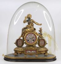 A late 19th century French gilt metal and porcelain mantel clock, surmounted with a maiden having