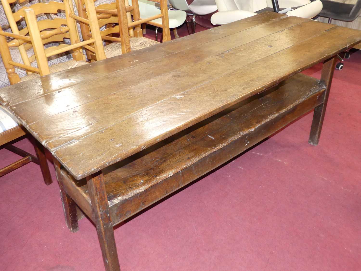 An antique joined oak and elm long bench settle, having a fold-over top, length 181cm Some losses - Image 4 of 8