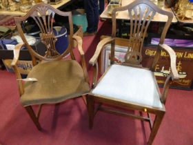 A 19th century mahogany Heppelwhite elbow chair; together with another mahogany Heppelwhite elbow