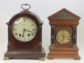A George V mahogany bracket clock in the Georgian style, having white enamel dial and eight-day