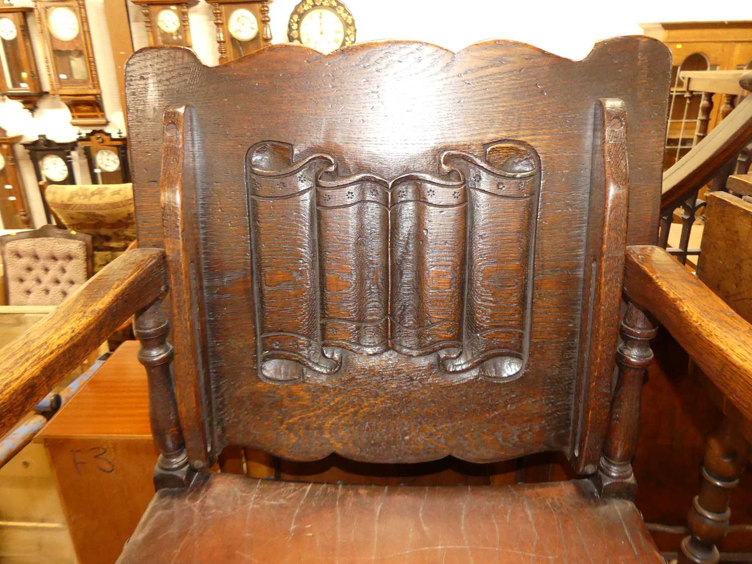 A joined oak fold-over monks chair, having a studded tan leather seat, w.52cm - Image 2 of 3