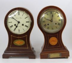 An Edwardian inlaid mahogany balloon shaped mantel clock, having silvered convex dial, eight-day
