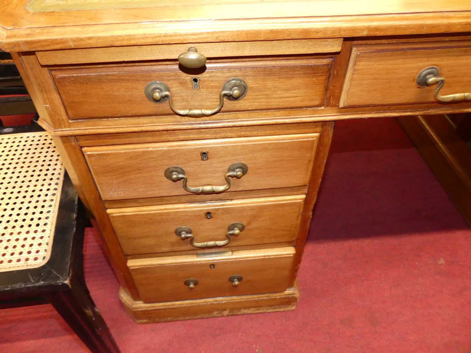 An early 20th century walnut and gilt-tooled green leather inset twin pedestal writing desk, - Image 3 of 3