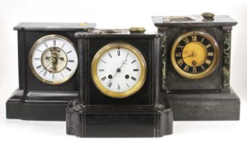 A late Victorian slate mantel clock with visible escapement, height 23cm, together with two other