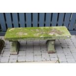 A concrete garden bench raised on twin pedestals, length 122cm