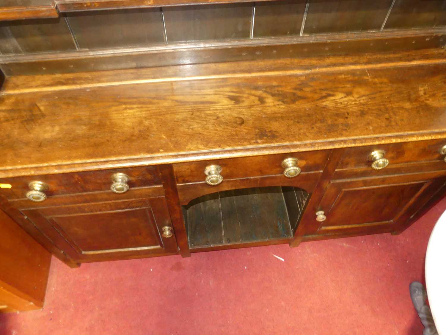 A circa 1800 provincial oak dresser, having three-tier open plate rack over base fitted with three - Image 4 of 4
