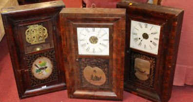 An American mahogany cased droptrunk wall clock (lacking dial); together with two others (3)