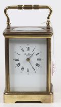 An early 20th century lacquered brass carriage clock, having visible platform escapement, the