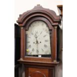 An early 19th century oak long case clock having unsigned 12" painted arch dial, twin winding