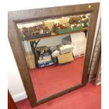 A contemporary bevelled rectangular wall mirror, with naturalistic frame, 112.5 x 92cm