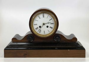 A Victorian ebonised drumhead mantel clock having French brass eight-day cylinder movement outside