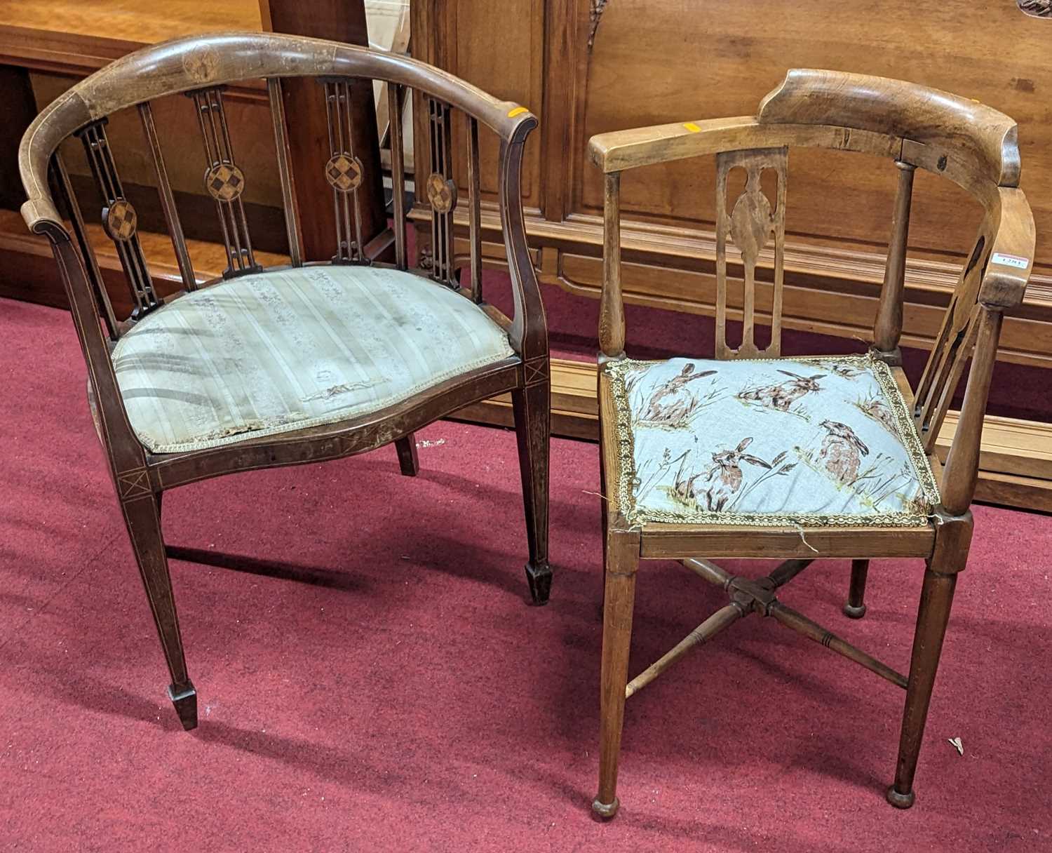 An Edwardian inlaid mahogany open armcahir, standing on tapered legs and spade feet, together with