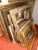 A selection of principally early 20th century gilt composition picture frames (8) Most with losses.