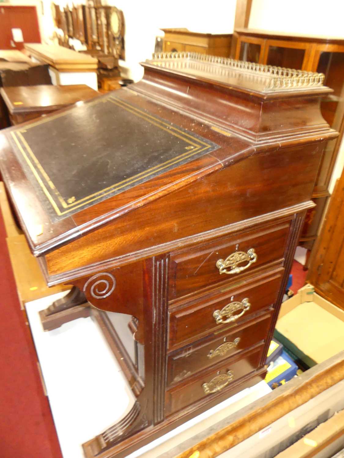 A late Victorian mahogany slopefront davenport, having a leather gilt-tooled inset surface, hinged - Image 2 of 3
