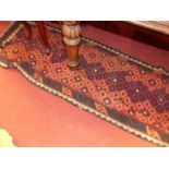 A Turkish woollen red ground kilim hall runner, 355 x 74cm, together with a further Persian