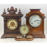 An Edwardian inlaid mahogany mantel clock, having unsigned white enamel dial and spring-driven